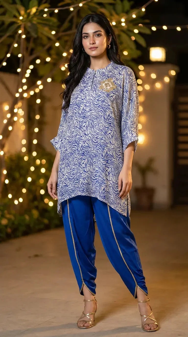 Woman in blue and white abstract print kaftan shirt with matching blue dhoti pants, Karchobi fashion