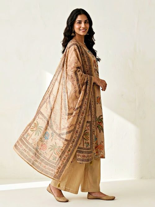Beige chanderi cotton suit set by Karchobi featuring tropical floral motifs, embroidery, kurta, pants, and dupatta for women.