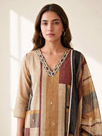 Beige and brown chanderi cotton suit set with geometric patterns, including kurta, pants, and dupatta, by Karchobi.