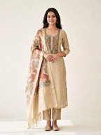 Beige chanderi cotton paisley embroidered suit set with kurta, pant, and animal art dupatta by Karchobi