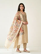 Beige chanderi cotton paisley embroidered suit set with neck detailing, animal art dupatta, kurta, and matching pants for women.