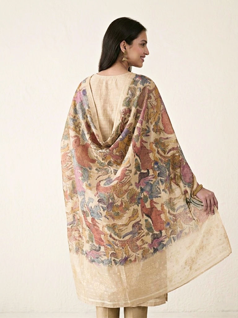 Beige chanderi cotton suit set with paisley embroidery, featuring a kurta, pants, and an embroidered dupatta by Karchobi.