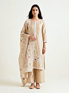 Beige chanderi cotton suit set with paisley embroidery, lace details, and matching dupatta, featuring intricate thread embroidery on the kurta.