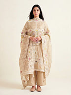 Beige chanderi cotton paisley embroidery suit set with lace and thread embroidery, includes kurta, pants, and dupatta.