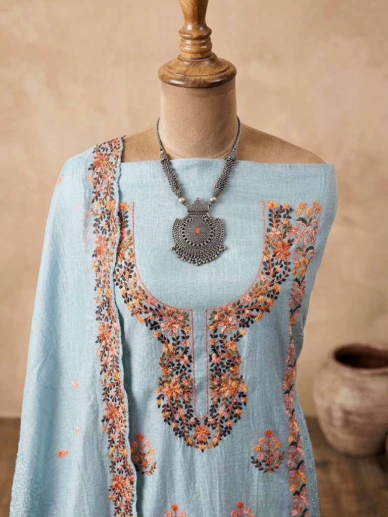 Powder blue chanderi cotton embroidered suit set with kurta, pants, and dupatta, featuring intricate thread embroidery by KARCHOBI.