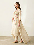 Ivory beige floral vine Chanderi cotton suit set with embroidered kurta, woven dupatta, and matching pants by Karchobi