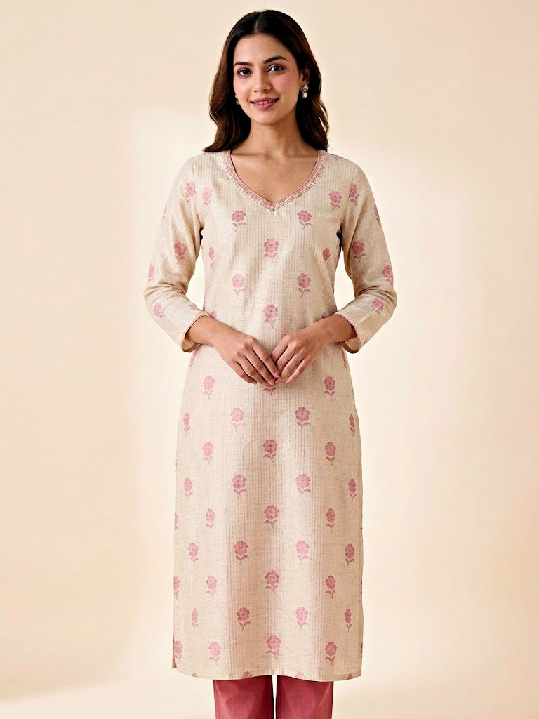 Ivory and pink Chanderi suit set with floral print, gold zari embroidery, woven dupatta, and matching kurta and pants.