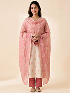 Ivory and pink chanderi suit set with floral print, gold zari embroidery, woven dupatta, kurta, and matching pants by Karchobi