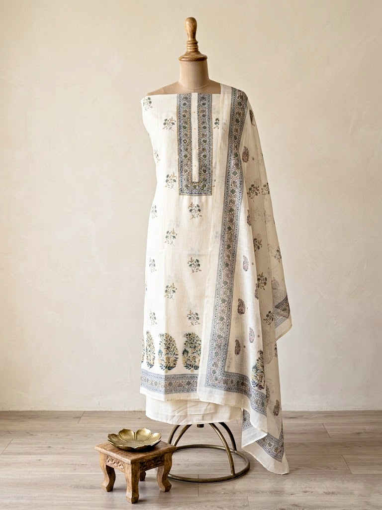 Off-White cotton linen paisley floral unstitched suit set by Karchobi, includes kurta, pants, and dupatta in vibrant print.