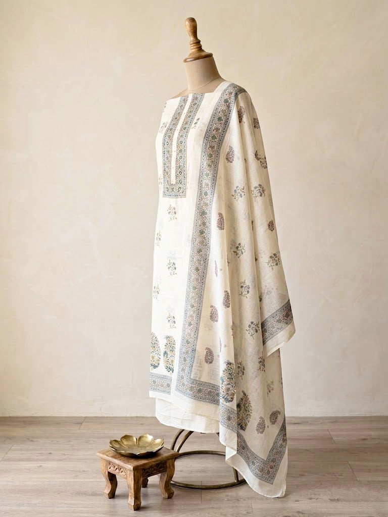 Off-White cotton linen paisley floral unstitched suit set by Karchobi, includes kurta, pants, and dupatta with intricate print.