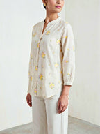 Off-White yellow floral embroidery cotton shirt by Karchobi, featuring pastel floral designs, casual workwear style.