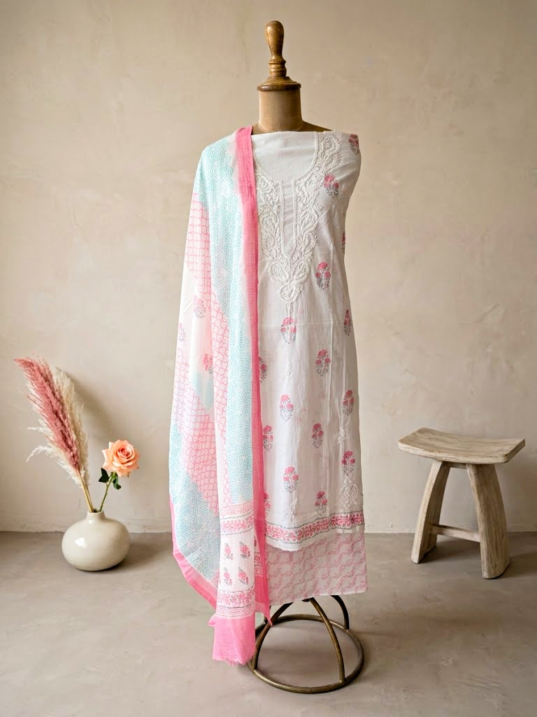White cotton block print unstitched suit set by Karchobi featuring floral kurta, palazzo pants, and matching dupatta for women.