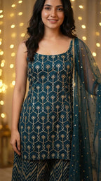 Woman in a dark teal blue gota embroidery kurta sharara set, festive ethnic wear from Karchobi