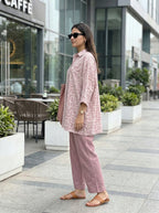Dusty rose cotton linen kaftan shirt and pant set by Karchobi with abstract print, displayed on a neutral background.