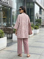 Dusty rose cotton linen kaftan shirt and pant set by Karchobi with abstract print, displayed on a neutral background.