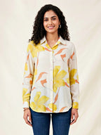Ivory and yellow floral crepe shirt by KARCHOBI featuring pastel floral print, suitable for casual and work wear.