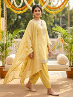 Lemon yellow shimmer tissue Farsi Salwar suit set with sequin lace detailing, traditional festive wear by KARCHOBI.