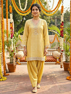 Lemon yellow shimmer tissue Farsi salwar suit set with sequin lace detailing, designed for festive wear by KARCHOBI.