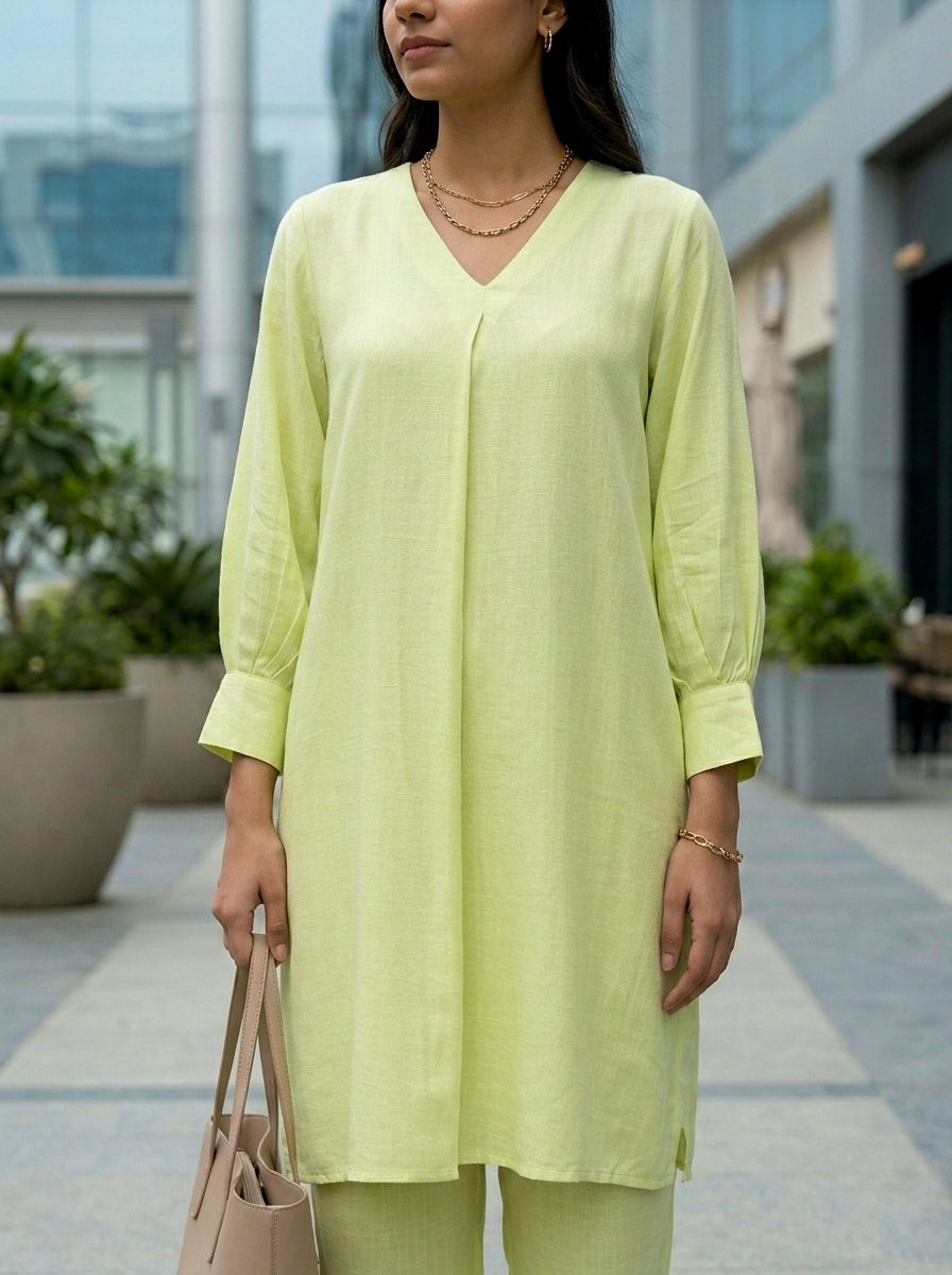 Lime green box pleat kurta and pant co-ord set by Karchobi, featuring stylish design and comfortable fabric.