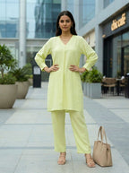 Lime green box pleat kurta and pant co-ord set by Karchobi, featuring elegant pleats and a stylish silhouette.