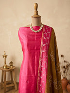 Hot pink Maheshwari unstitched suit set by Karchobi featuring a fabric kurta, pants, and dupatta for women's traditional attire.