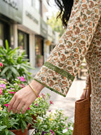 Ivory beige cotton Mul Paisley co-ord set with Croatia lace trims, featuring colorful paisley print and casual Afghan salwar style.