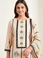 Cream floral muslin cotton suit set with kurta, pant, and dupatta from Karchobi, featuring delicate tree print designs for women.