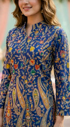Woman in navy blue achkan kurta with vibrant gota paisley embroidery from Karchobi