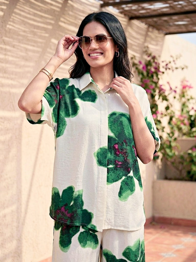 Off-White green floral co-ord set by KARCHOBI featuring a tunic and pants with vibrant floral patterns.