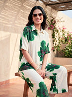 Off-White green floral co-ord set by Karchobi featuring a tunic and matching pants with vibrant floral patterns.