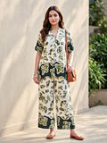 Off-white and green rayon slub kurta and pant co-ord set with box pleats, floral design, by Karchobi, suitable for women.