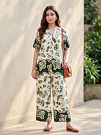 Off-white and green rayon slub kurta and pant co-ord set with box pleats, floral design, by Karchobi, suitable for women.