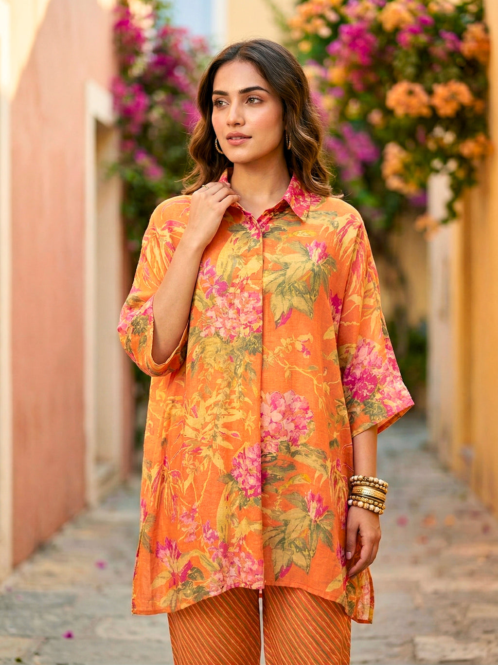 Orange floral print kaftan shirt and pant co-ord set by KARCHOBI, featuring diagonal stripes and relaxed fit for women.