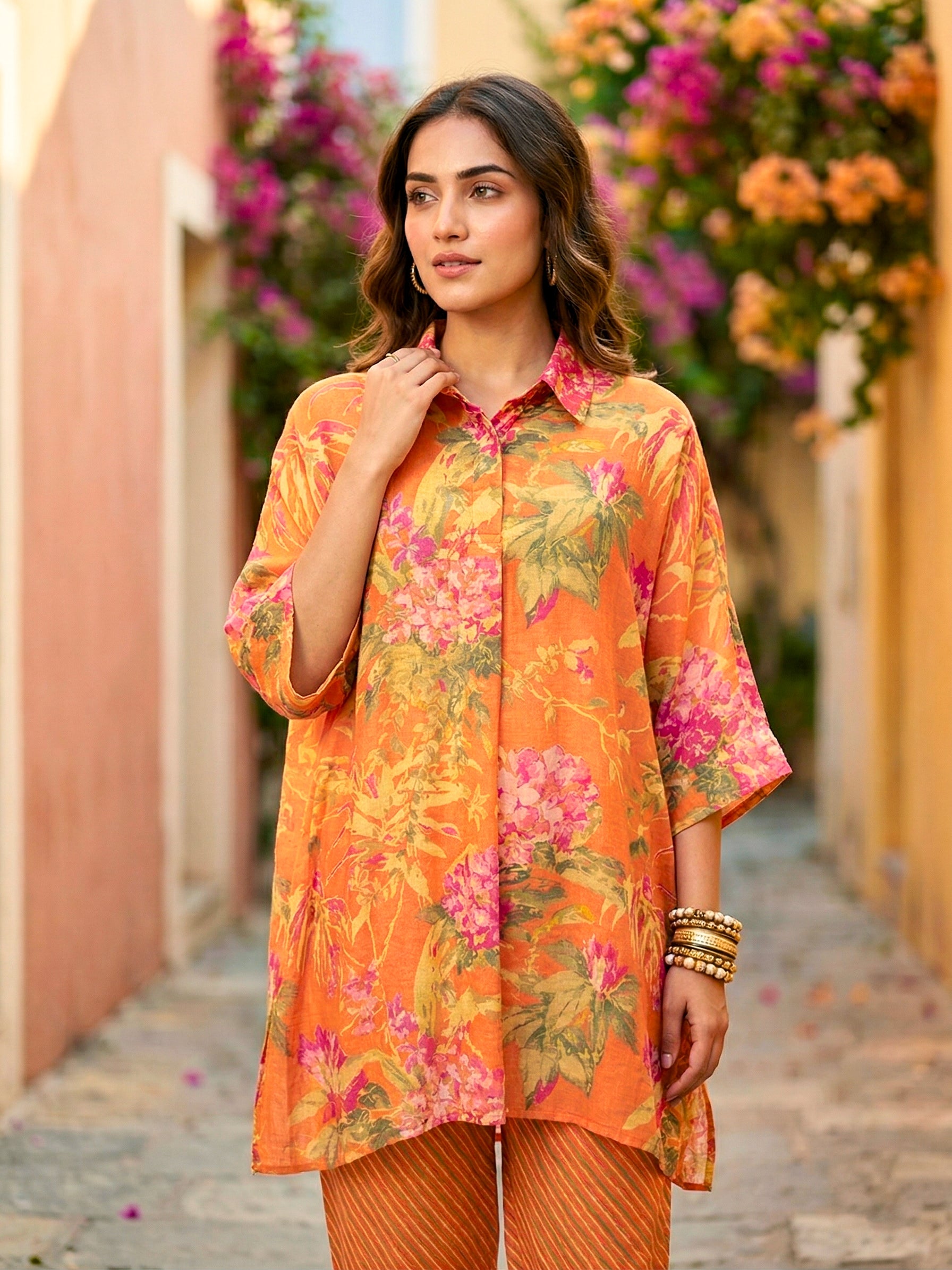 Orange floral print kaftan shirt and pant co-ord set by KARCHOBI, featuring diagonal stripes and relaxed fit for women.
