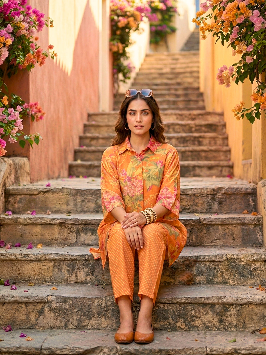 Orange floral print kaftan shirt and striped pants co-ord set by Karchobi, stylish women's casual wear with vibrant patterns.