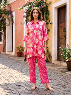 Pink floral print kaftan shirt and polka dot pants co-ord set by Karchobi, featuring a relaxed fit and stylish design.