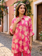Pink floral print kaftan shirt and polka dot pants co-ord set by Karchobi, featuring a stylish and comfortable women's matching outfit.