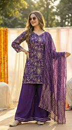 Woman outdoors in a purple floral sequin embroidered kurta sharara set with dupatta from Karchobi