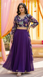 Woman wearing a purple floral embroidered crop top cape skirt set with gold sequin details, Karchobi fashion