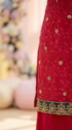 Rani pink chinon kurta with gold floral buti embroidery and decorative hem from Karchobi