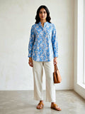 Karchobi blue floral print casual rayon shirt for women, suitable for work or everyday wear, with a vibrant floral pattern.