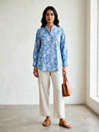 Karchobi blue floral print casual rayon shirt for women, suitable for work or everyday wear, with a vibrant floral pattern.