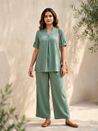 Sage green rayon slub box pleat kurta and pant co-ord set for women by Karchobi, featuring a stylish tunic and matching pants.