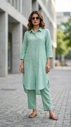 Woman wearing solid mint green long kurta co-ord set from Karchobi, outdoors, street style