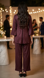 Woman in wine shimmer peplum co-ord set at elegant indoor event, Karchobi fashion