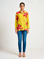 Yellow floral crepe shirt by KARCHOBI featuring a casual workwear design with vibrant floral print.