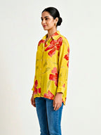 Yellow floral crepe shirt by KARCHOBI featuring a vibrant floral print, suitable for work or casual wear.