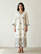 Off-white and black kurta dress with floral embroidered motifs and applique details, featuring a long, elegant design by Karchobi.