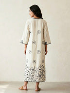 Off-white and black long kurta dress by Karchobi with floral embroidered motifs and appliqué detailing.